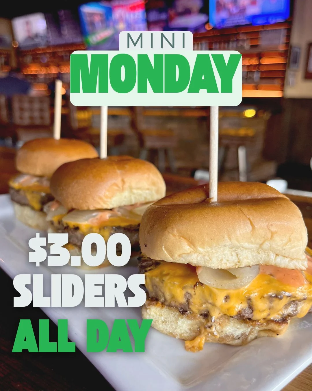 Mini cheeseburger sliders on a platter