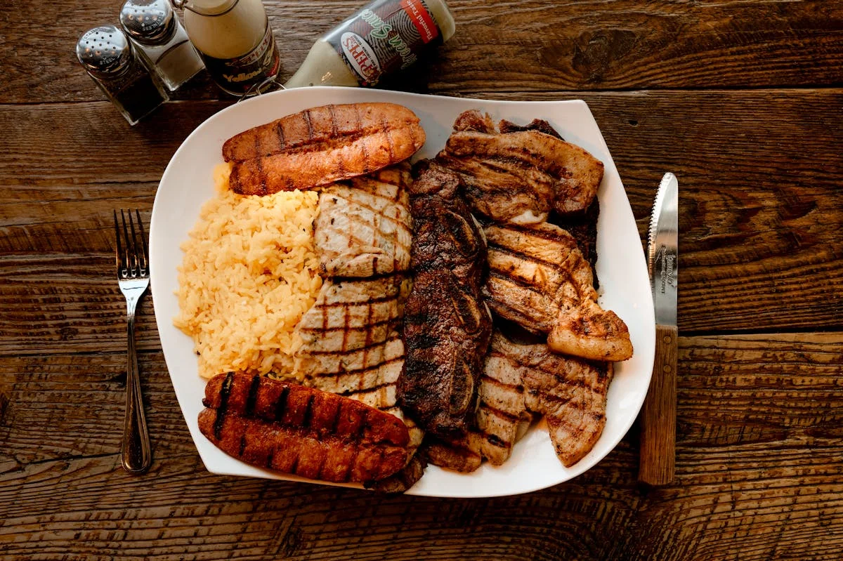 Grilled mixed meats platter with yellow rice