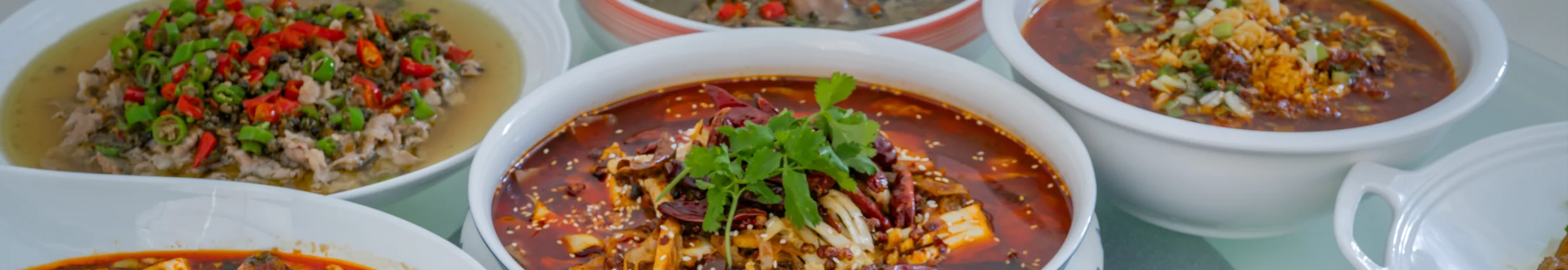 Spicy Sichuan hot pot with various ingredients