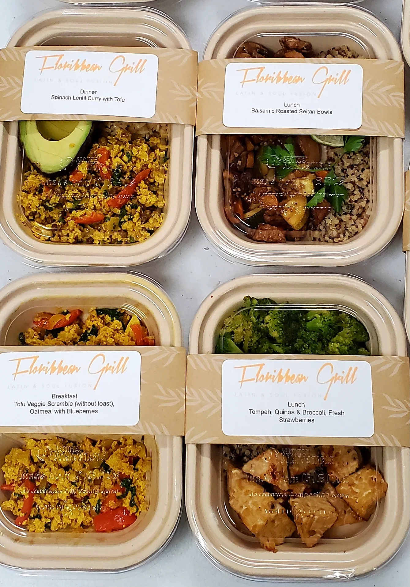 Variety of Latin and soul fusion meal prep containers