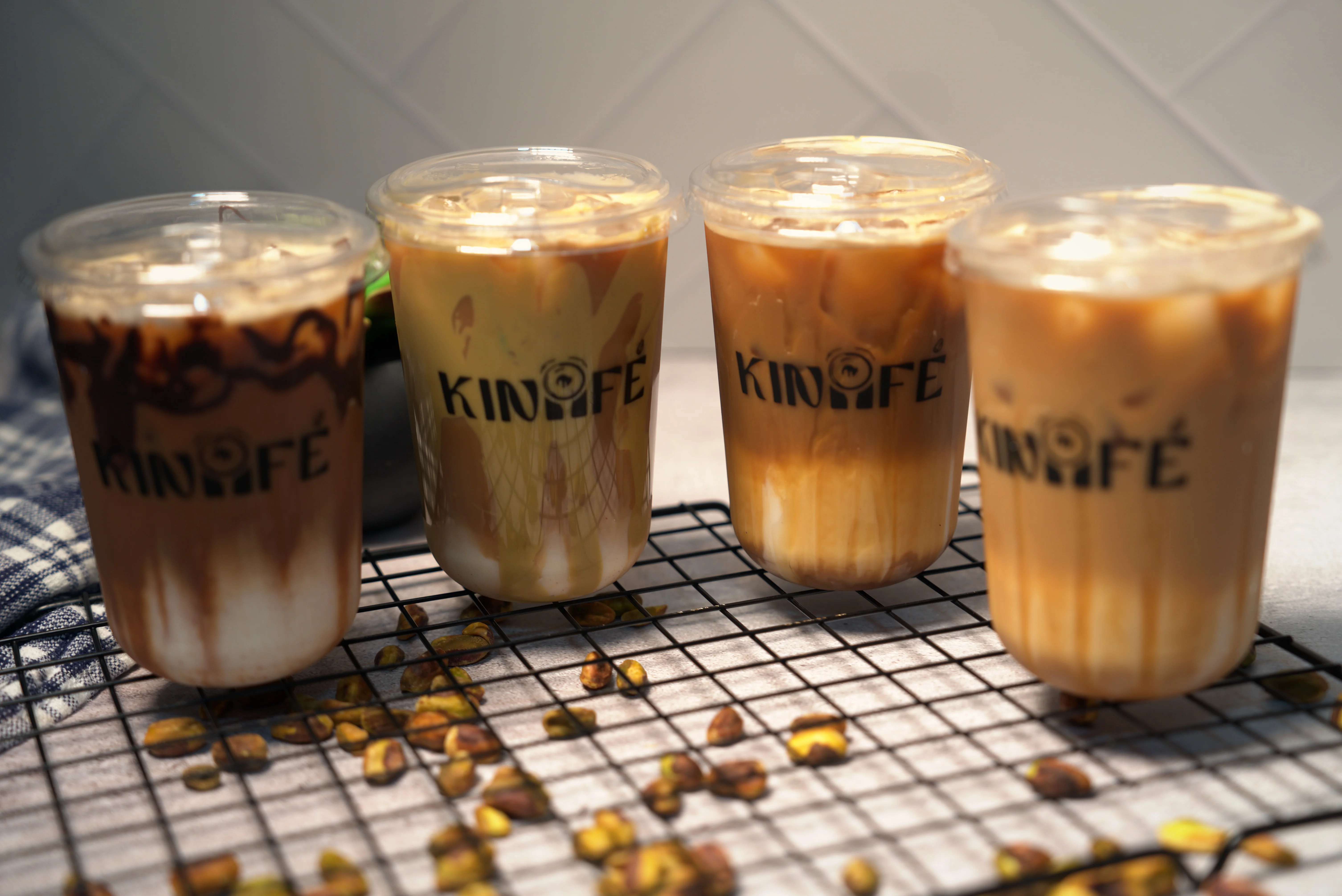 Blurred orange beverages in clear glasses
