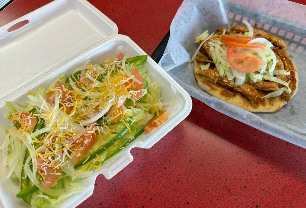 Fresh Mexican taco with grilled chicken and salad