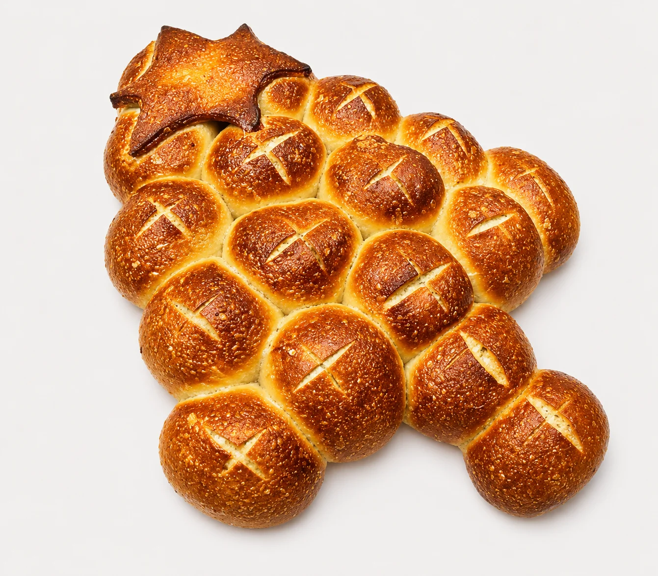 Bread shaped like a Christmas tree with a star on top.