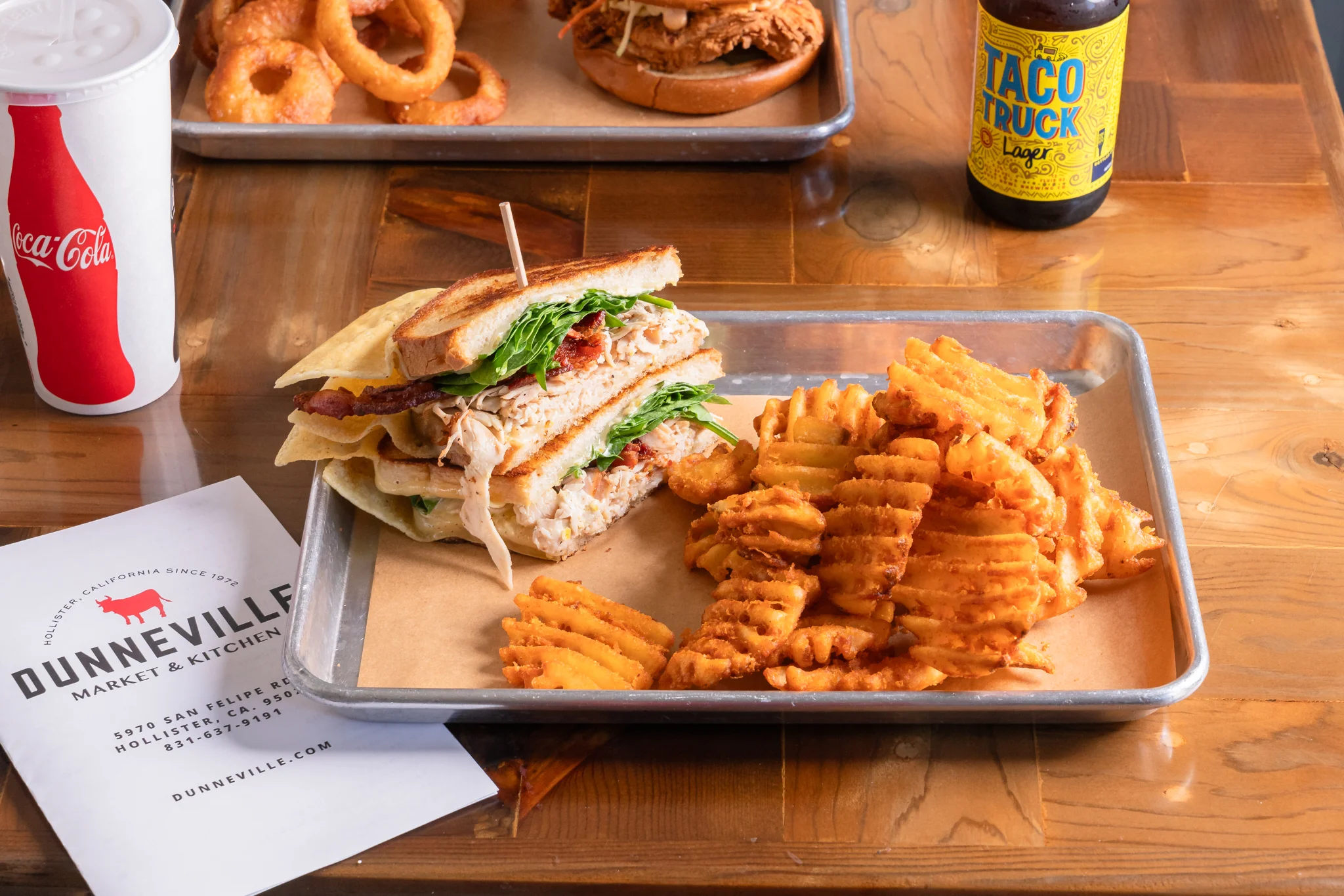 Turkey melt sandwich with melted cheese on toasted bread