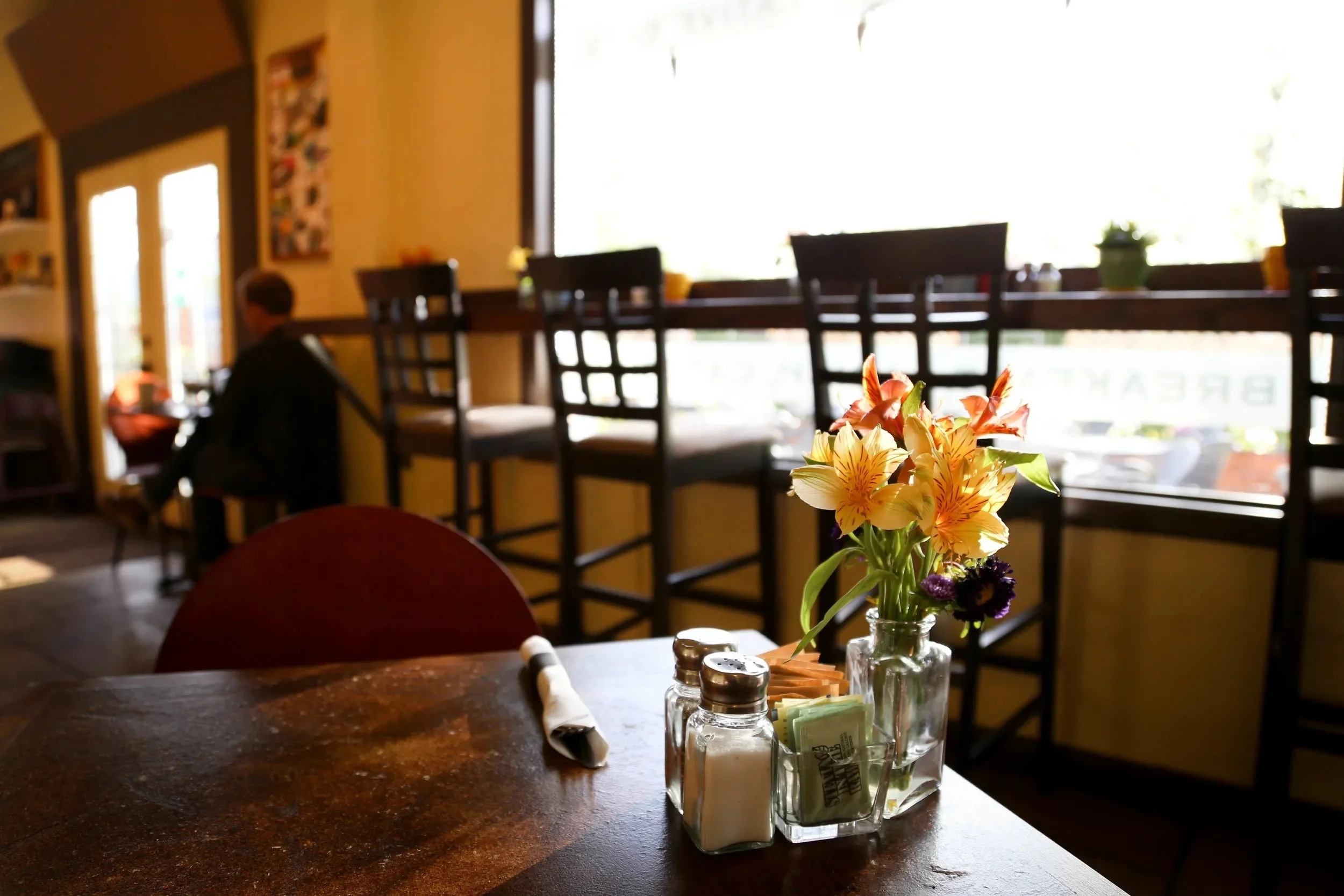 A table by the window at Roots Cafe