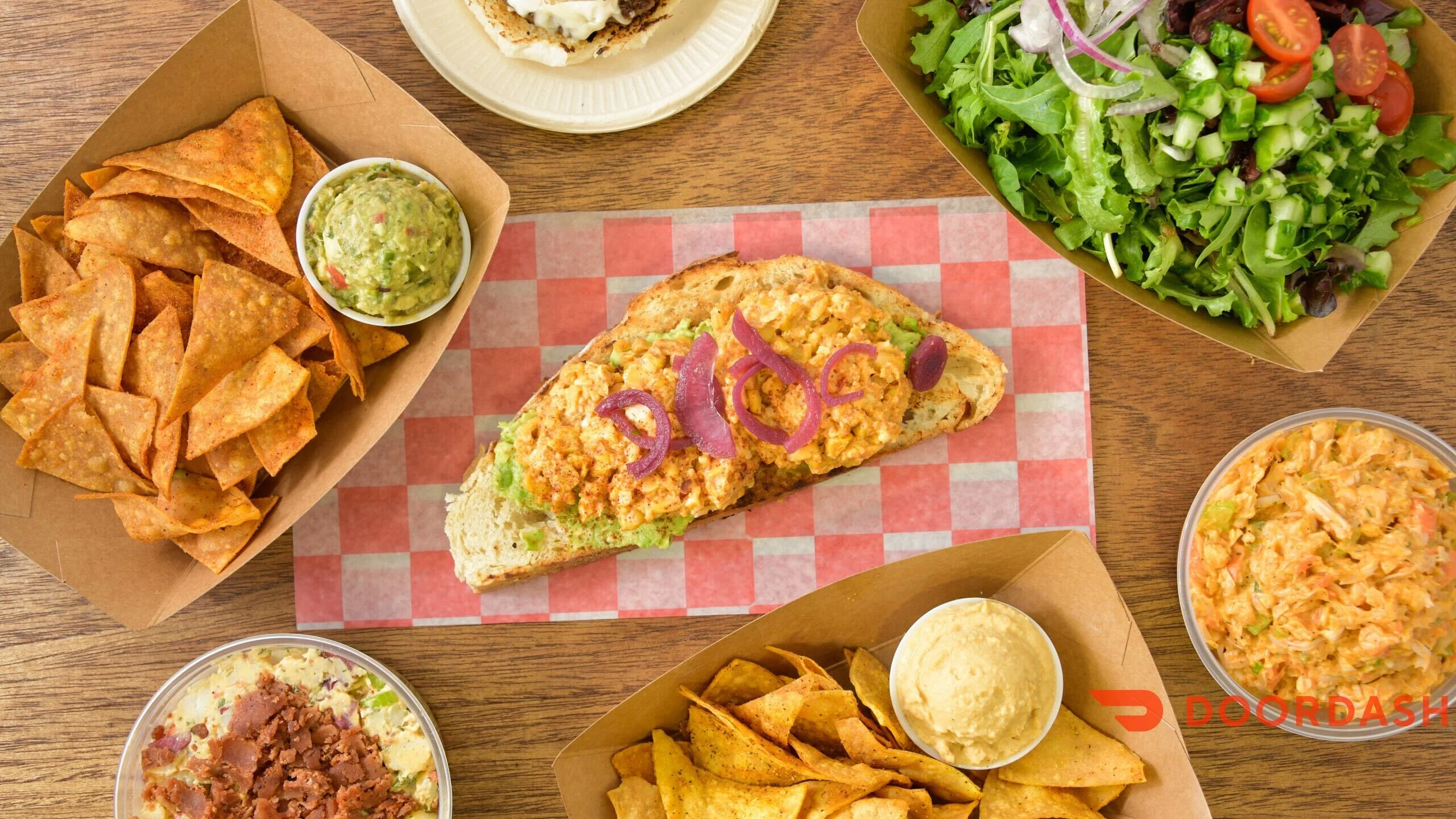 Mexican torta with guacamole and tortilla chips