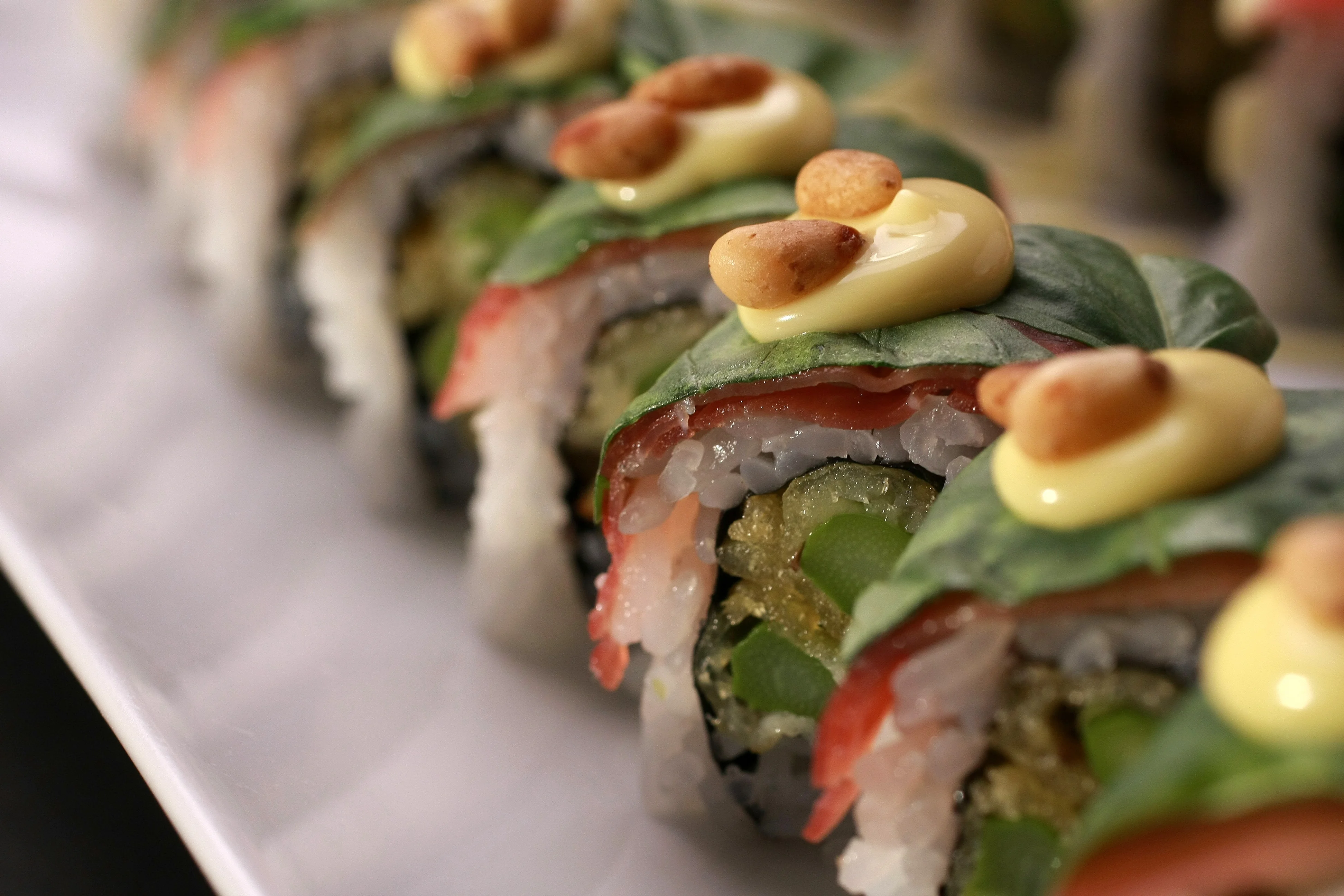 Colorful sushi rolls with unique toppings