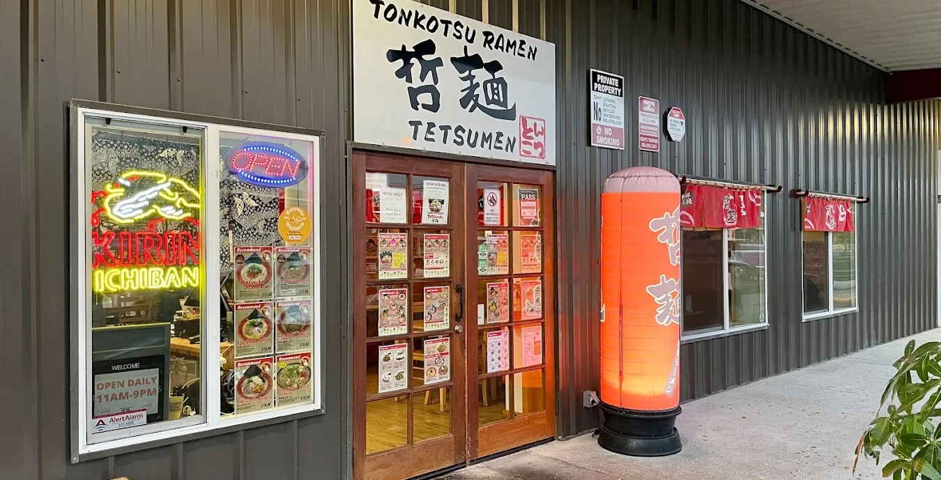 Entrance of a Japanese ramen restaurant featuring tonkotsu ramen