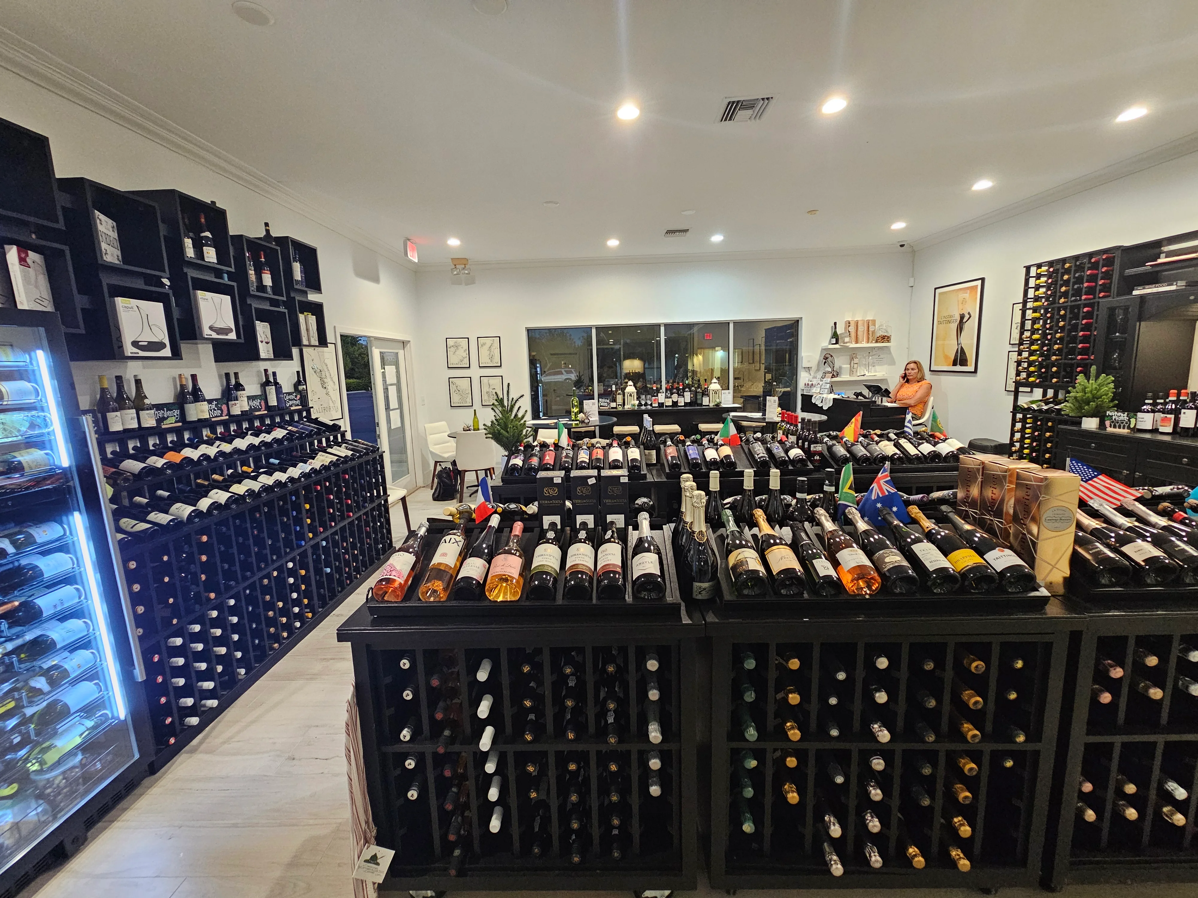 Wine shop interior showcasing a variety of wine bottles and elegant decor