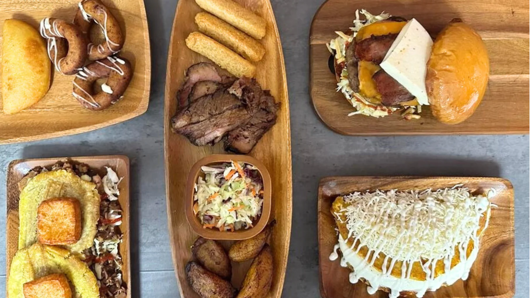 Assorted Caribbean dishes including jerk chicken and plantains