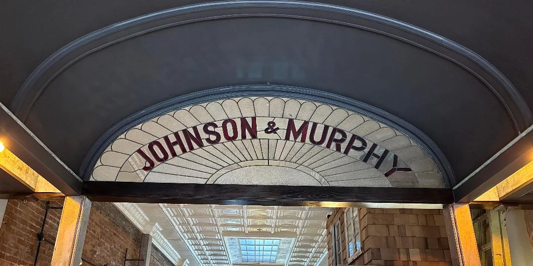 Elegant restaurant entrance with vintage signage