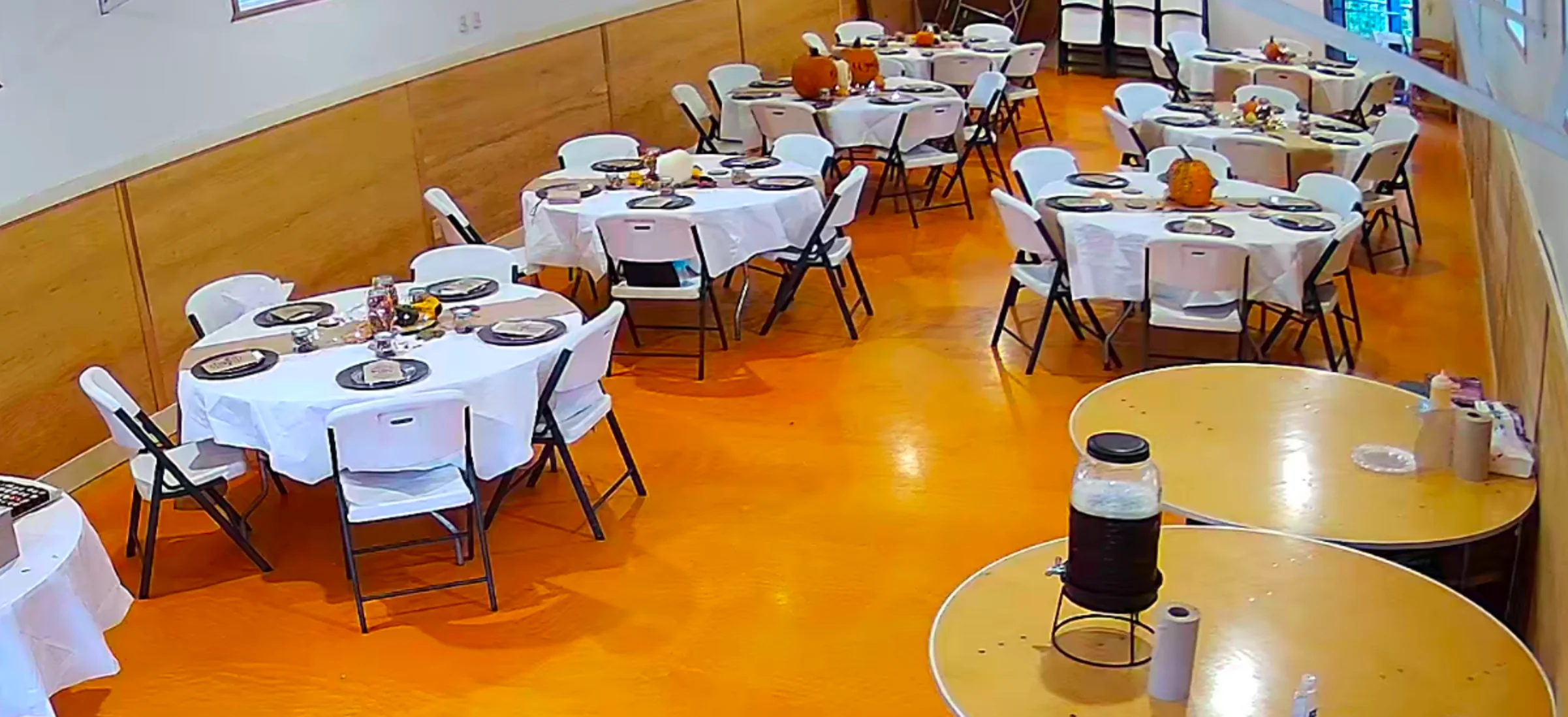 Cozy restaurant interior with tables set for dining