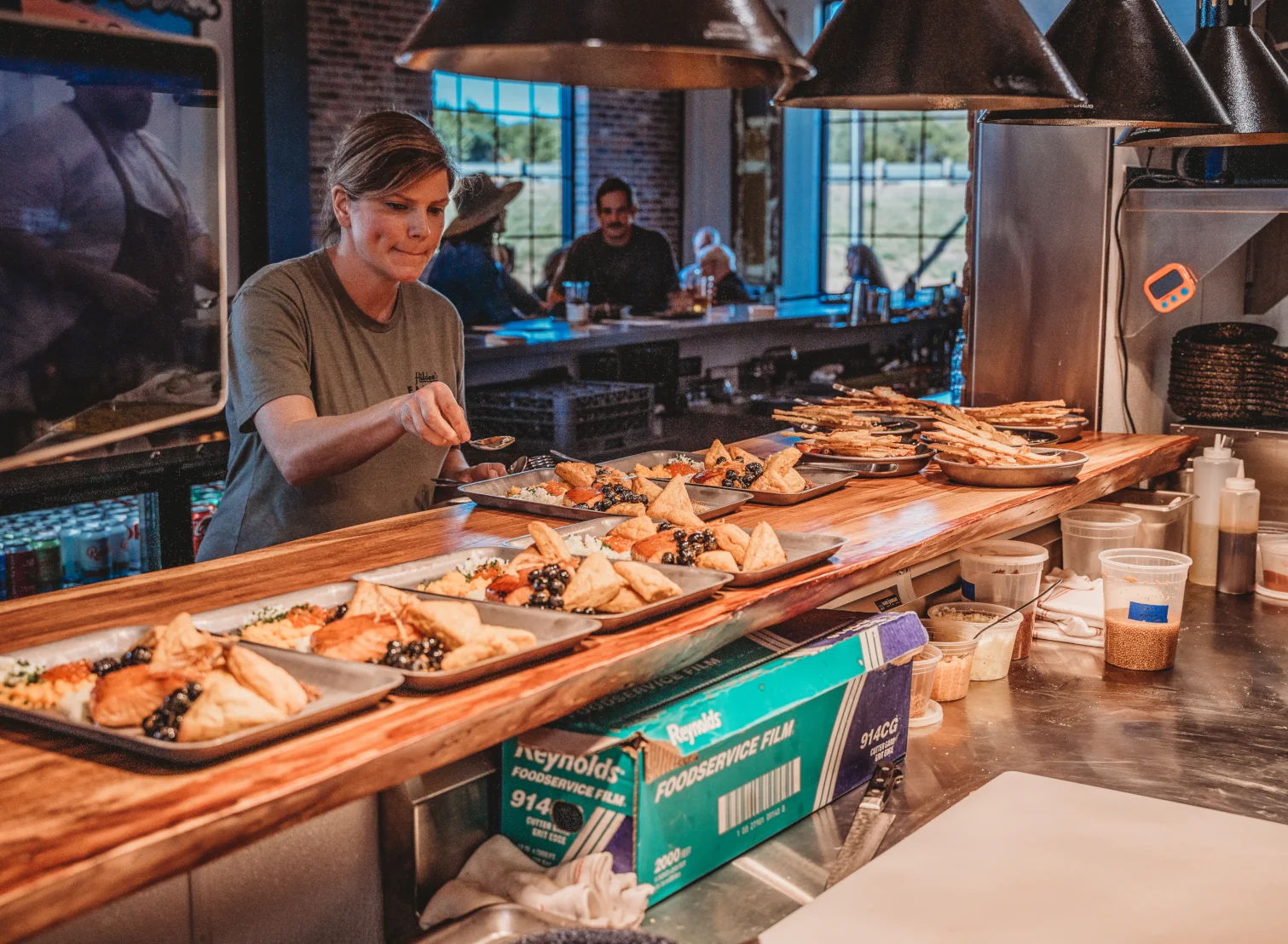 Plated Mediterranean appetizers in a vibrant restaurant setting