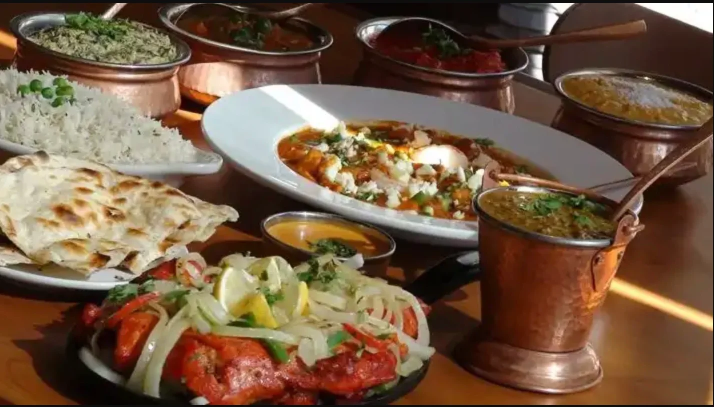 A restaurant chef preparing a dish