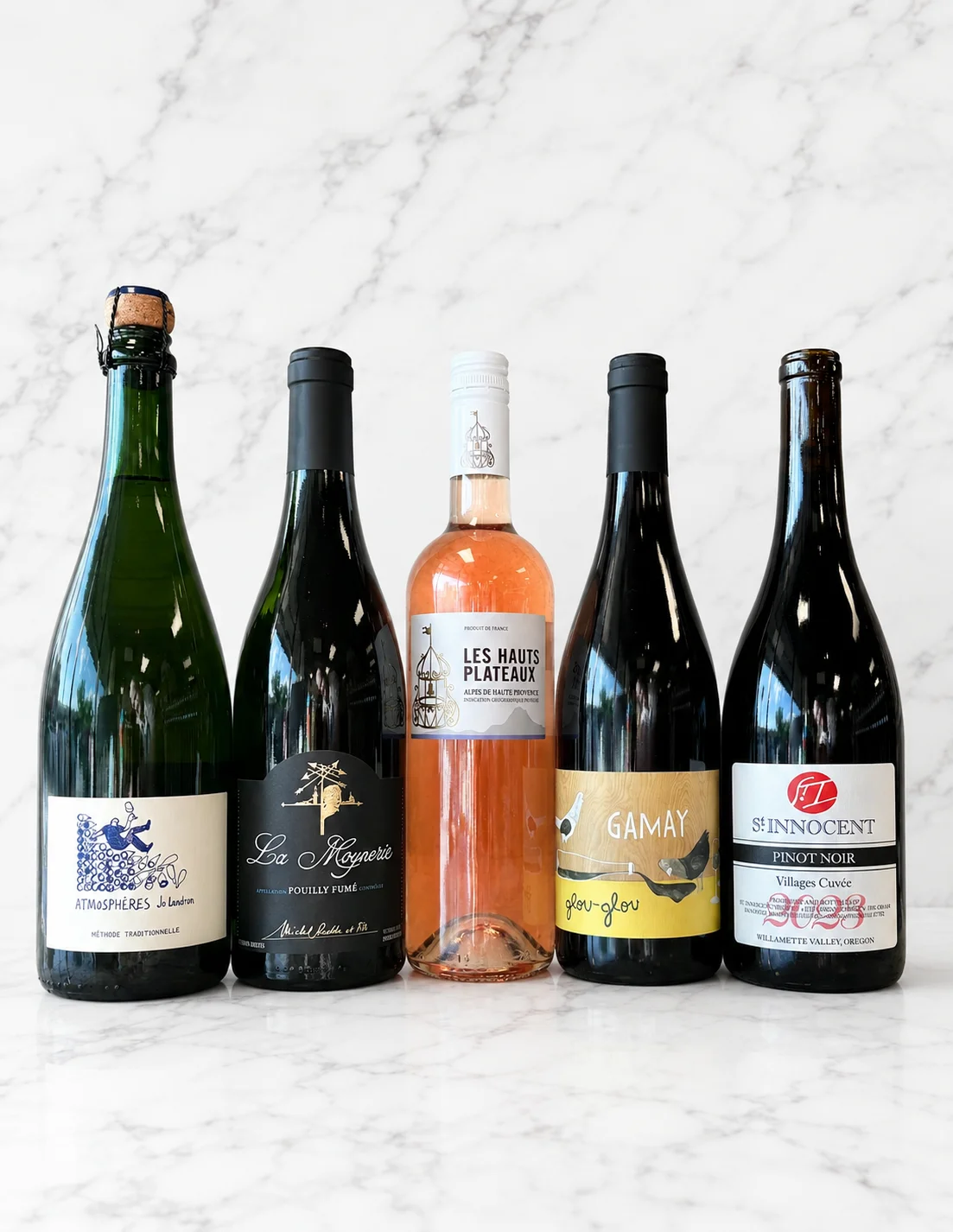 Selection of fine wines on a marble countertop