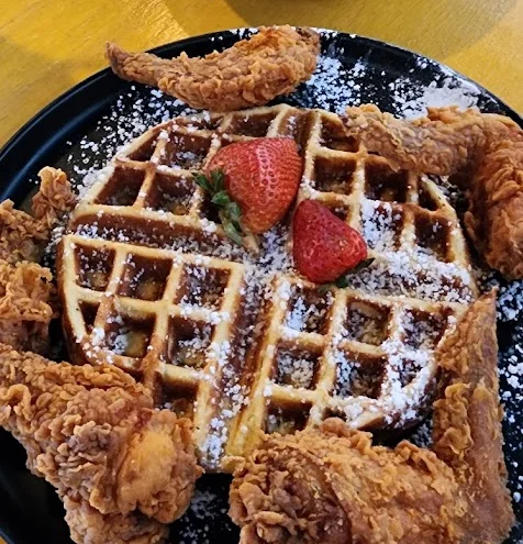 Southern chicken and waffles with strawberries