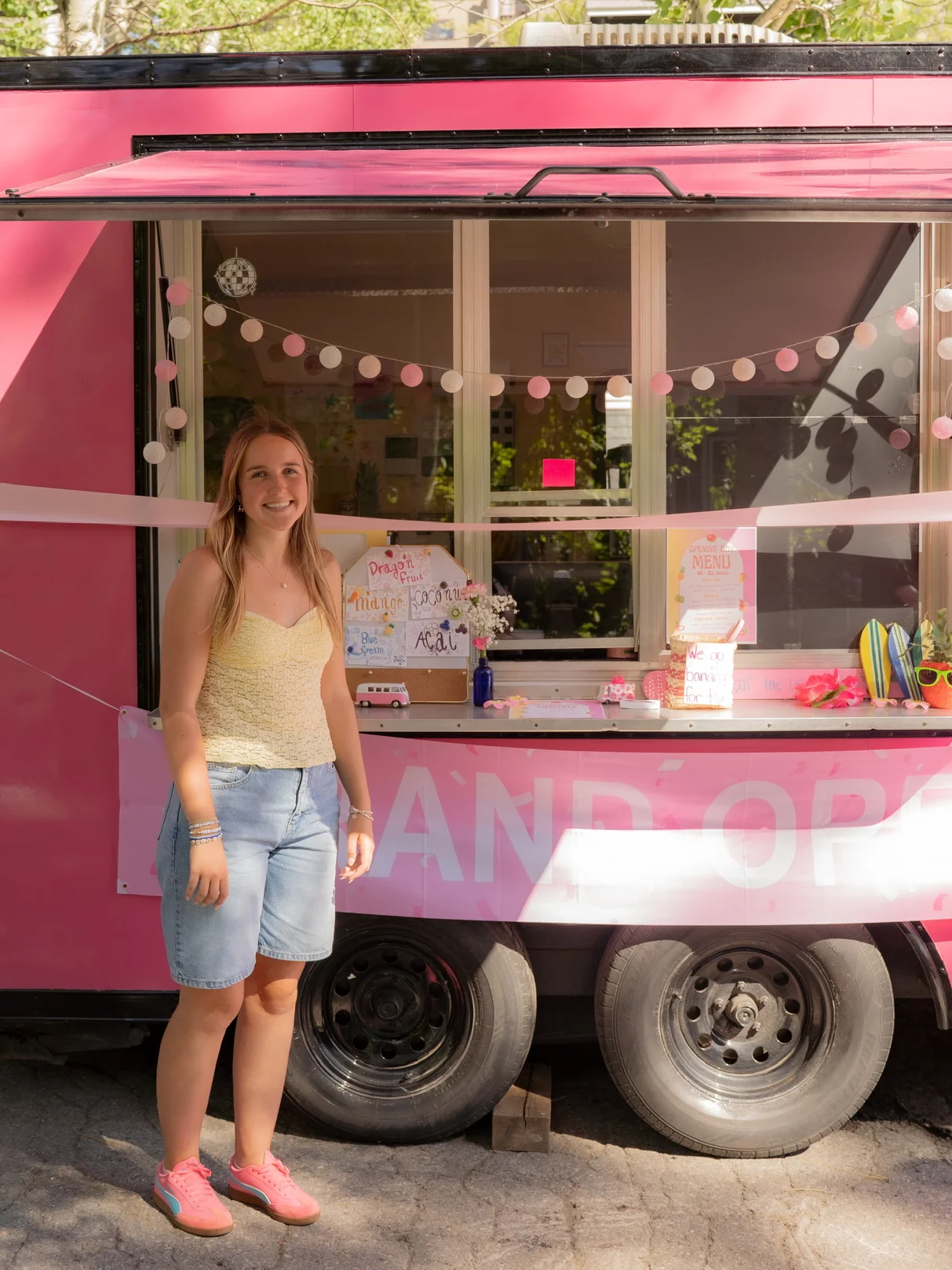 Food truck with colorful decor and menu display
