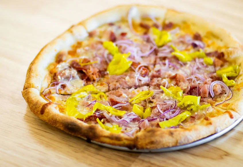 Savory Chicago-style pizza topped with pepperoncini