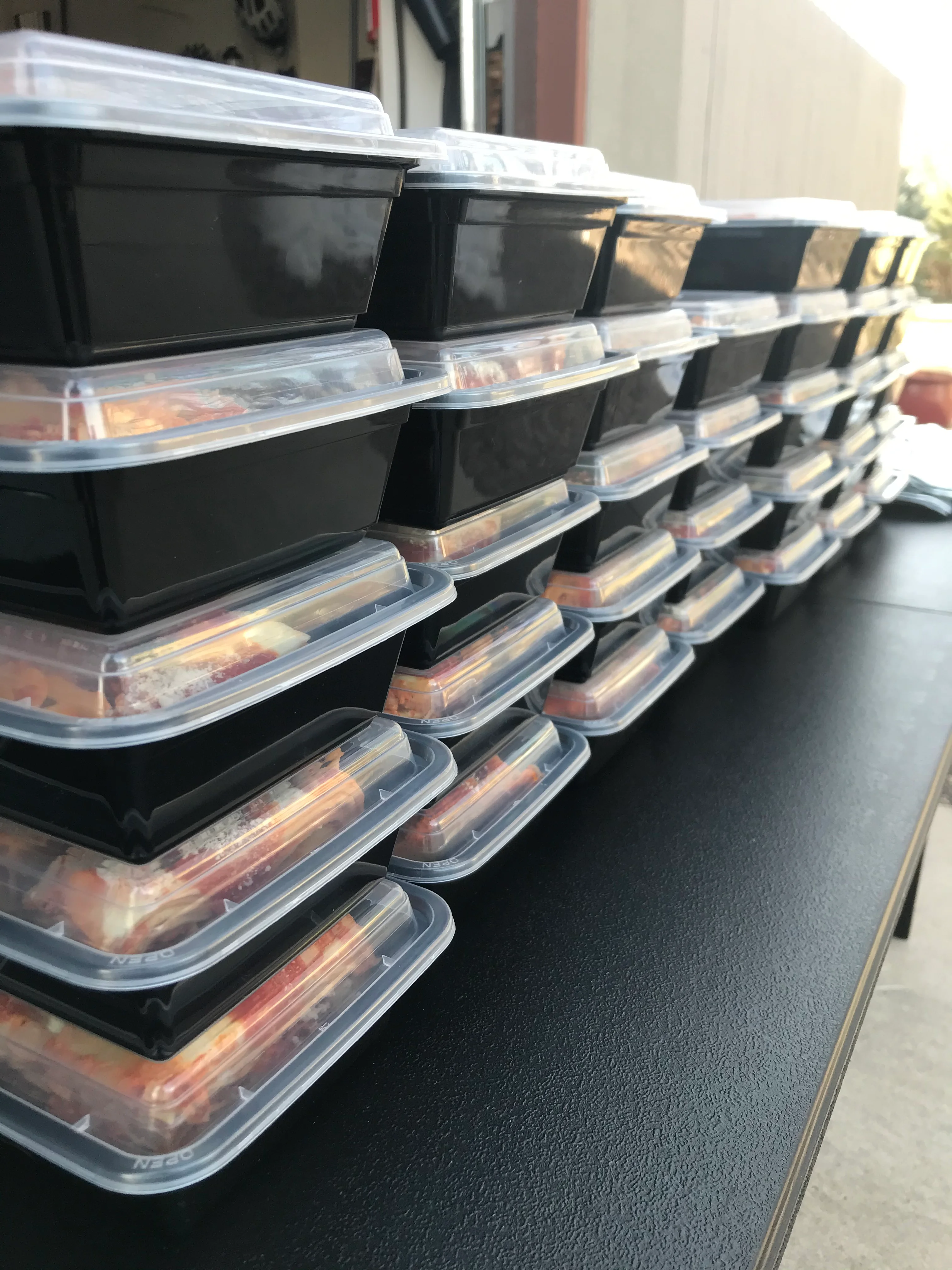 Stacked meal prep containers for healthy lunches