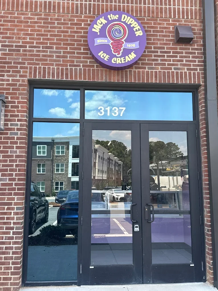 Exterior of Jack the Dipper Ice Cream shop with logo and entrance