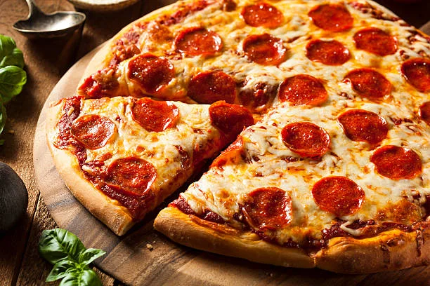Classic pepperoni pizza on a wooden board