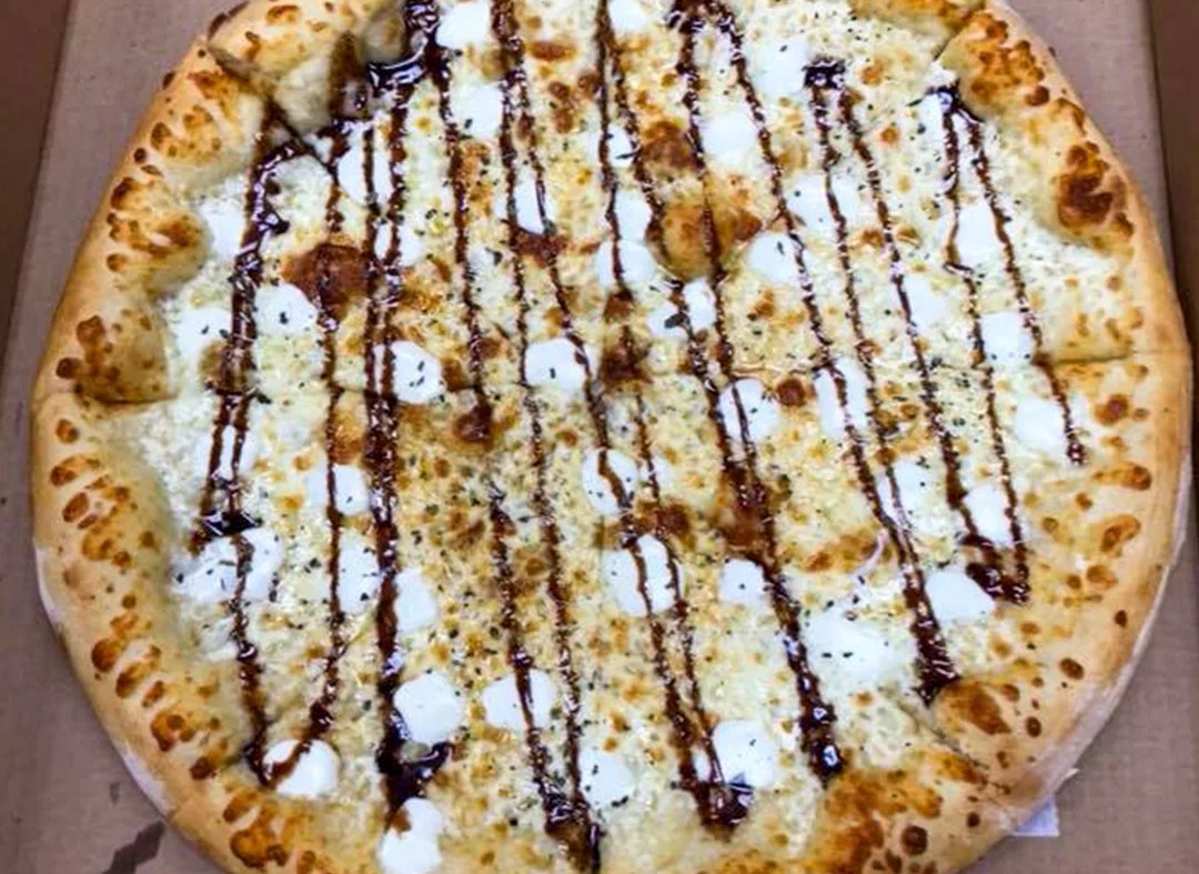BBQ chicken pizza with creamy drizzle