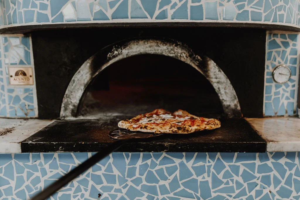 Margherita pizza in a wood-fired oven