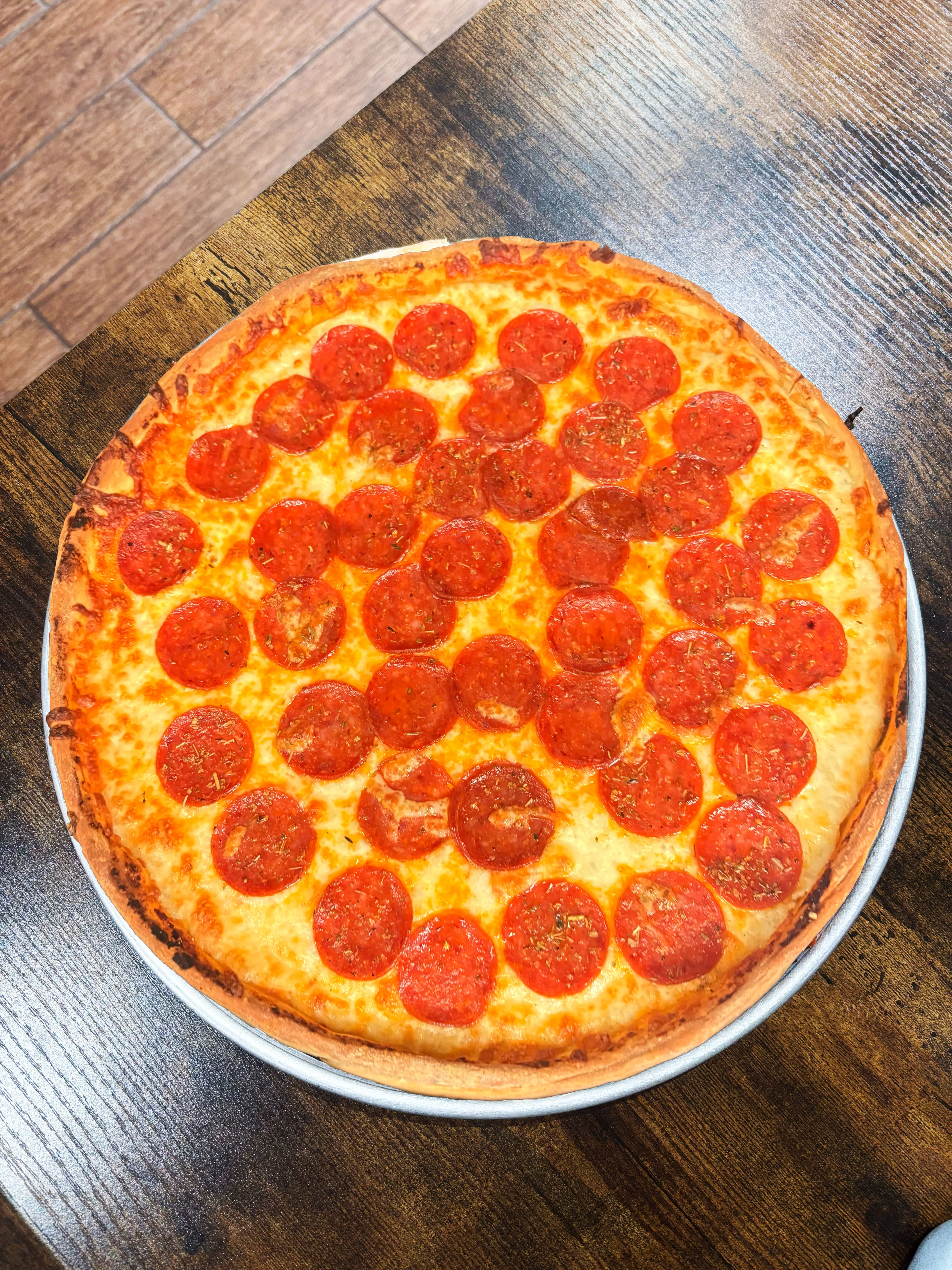 Pepperoni pizza served in a classic pizza box