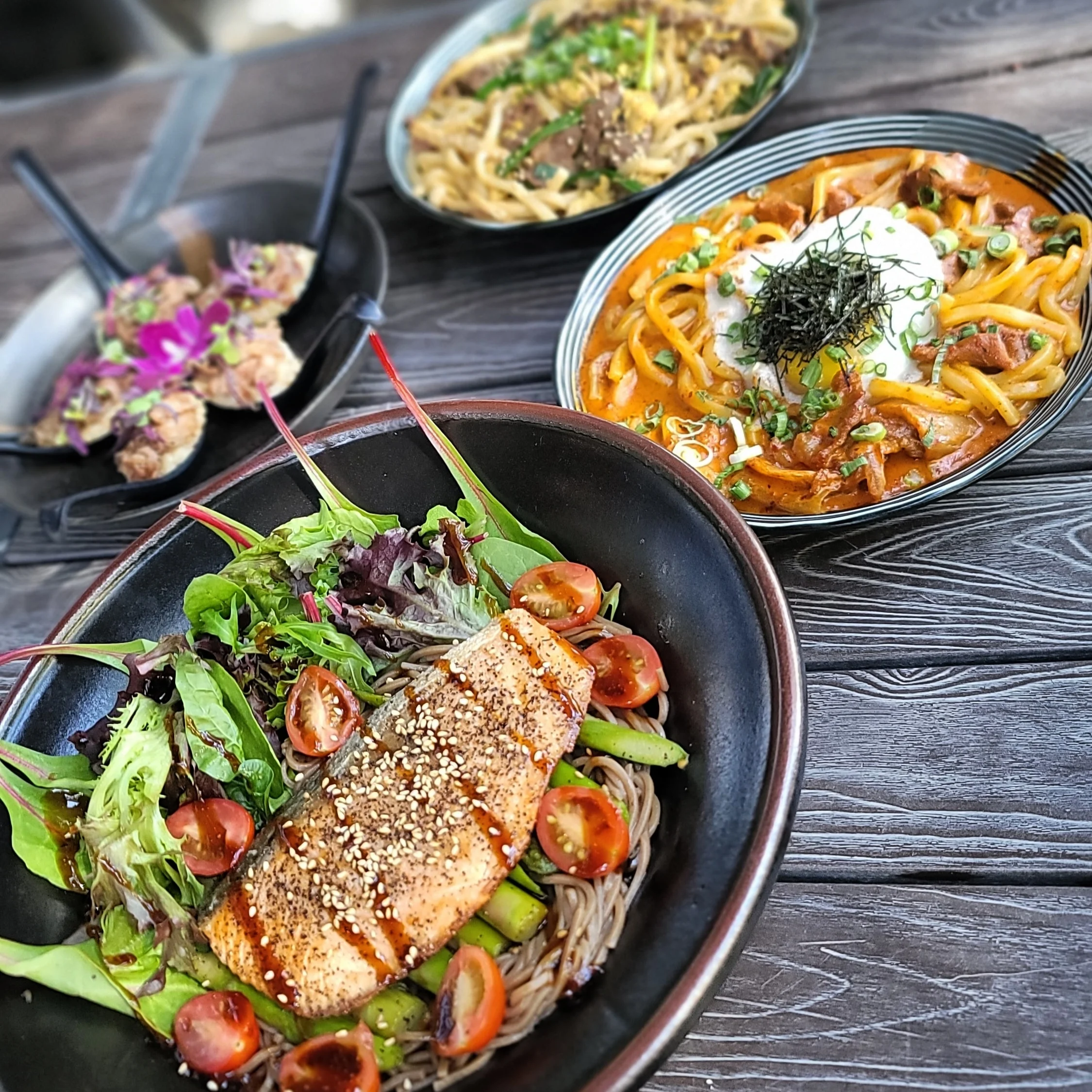 Grilled salmon soba salad with fresh greens