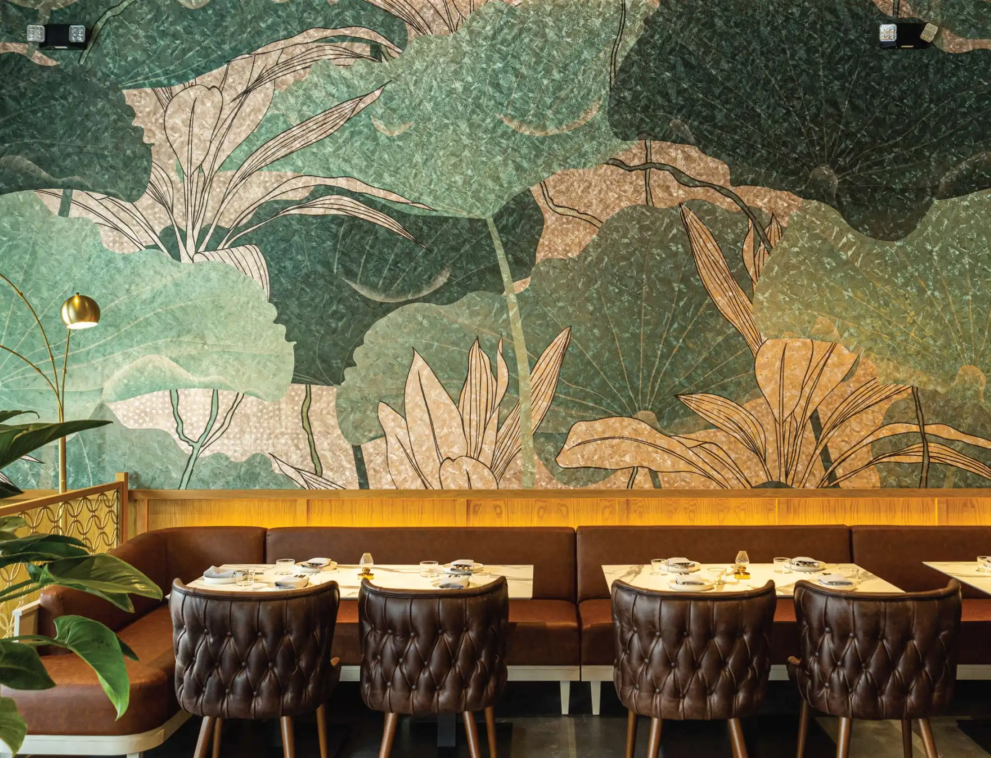 Kingfisher dinning room with lotus wallpaper.