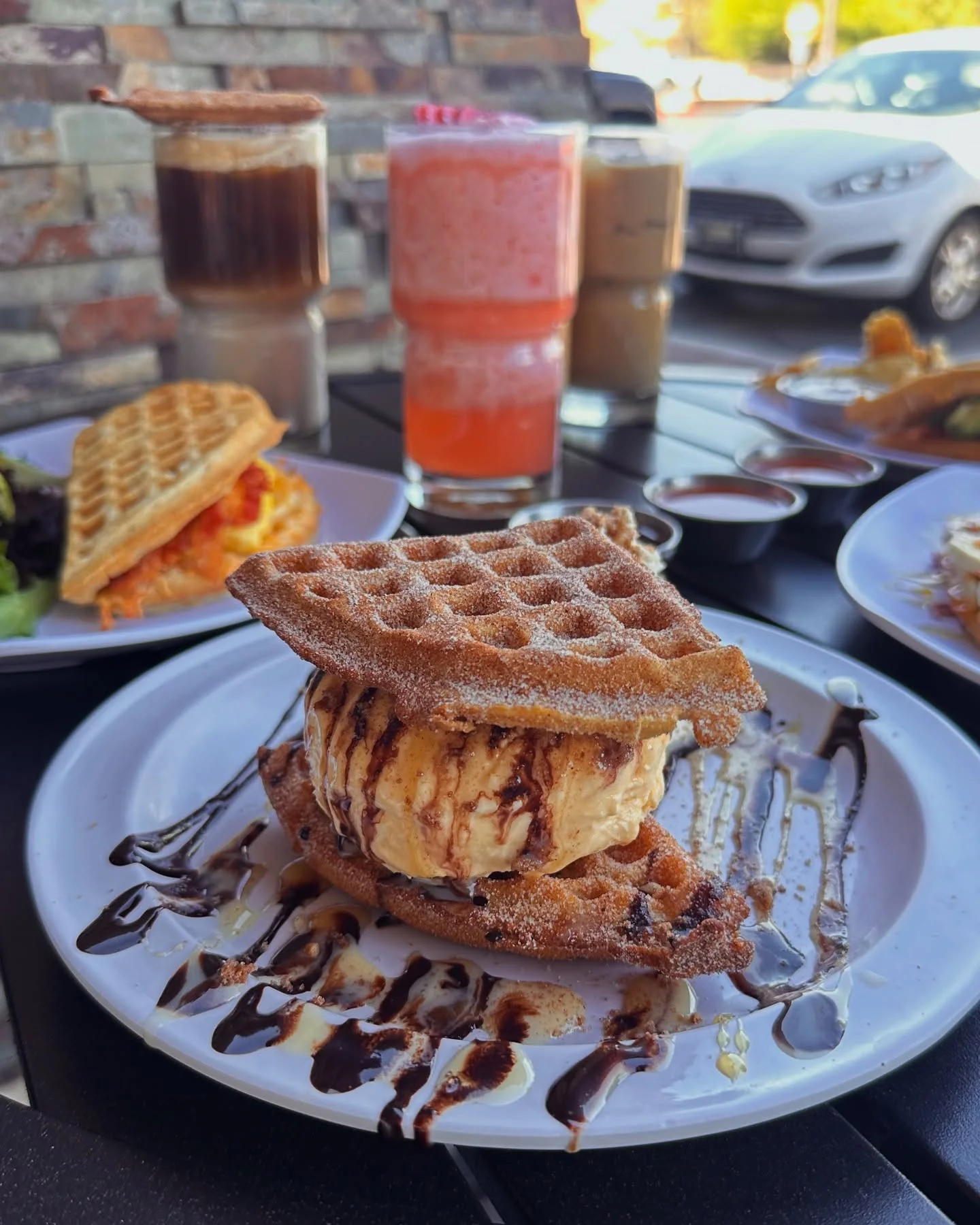 Delicious gourmet burger with fresh toppings on a wooden table