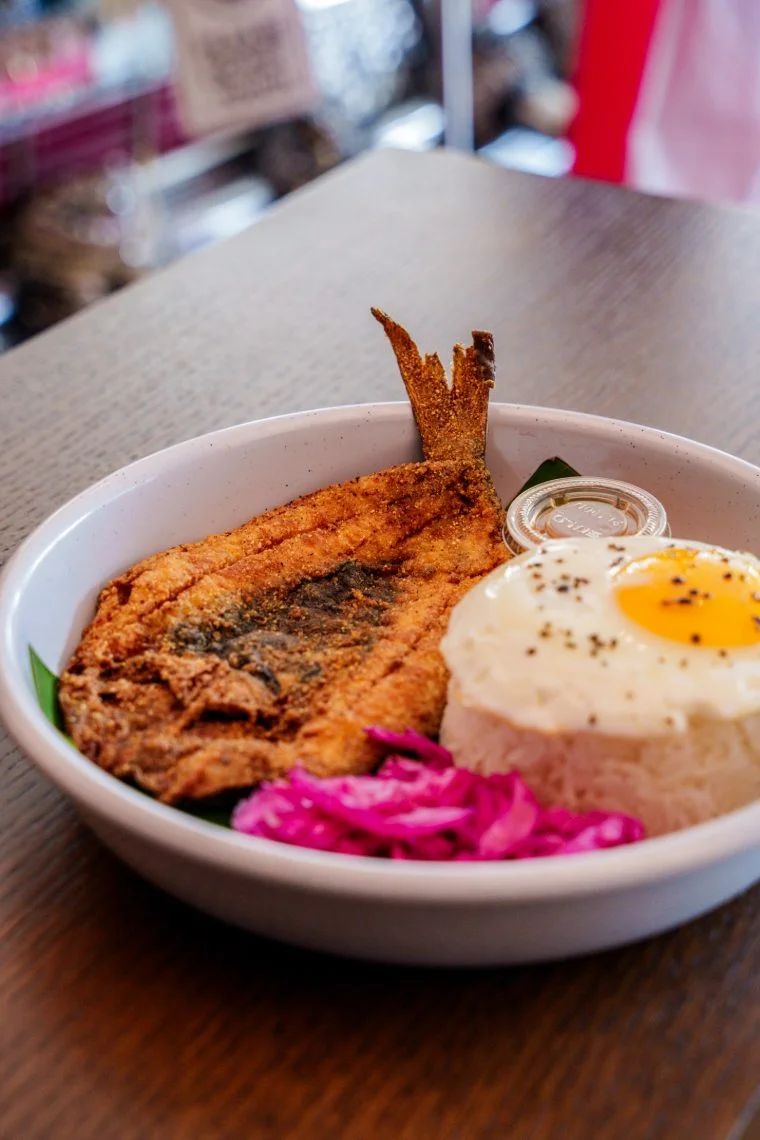 Filipino crispy bangus served with rice and egg