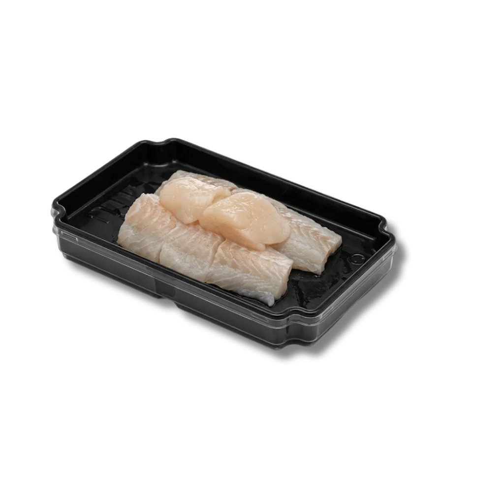 Fresh fish fillets in a black plastic container