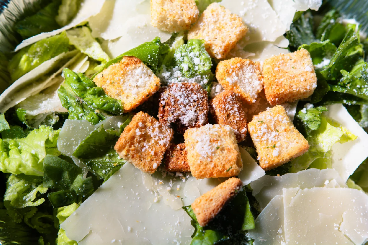 Classic Caesar salad with croutons and parmesan cheese