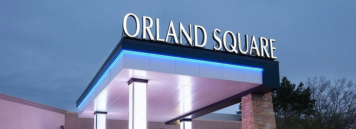 Entrance of Orland Square shopping mall at dusk