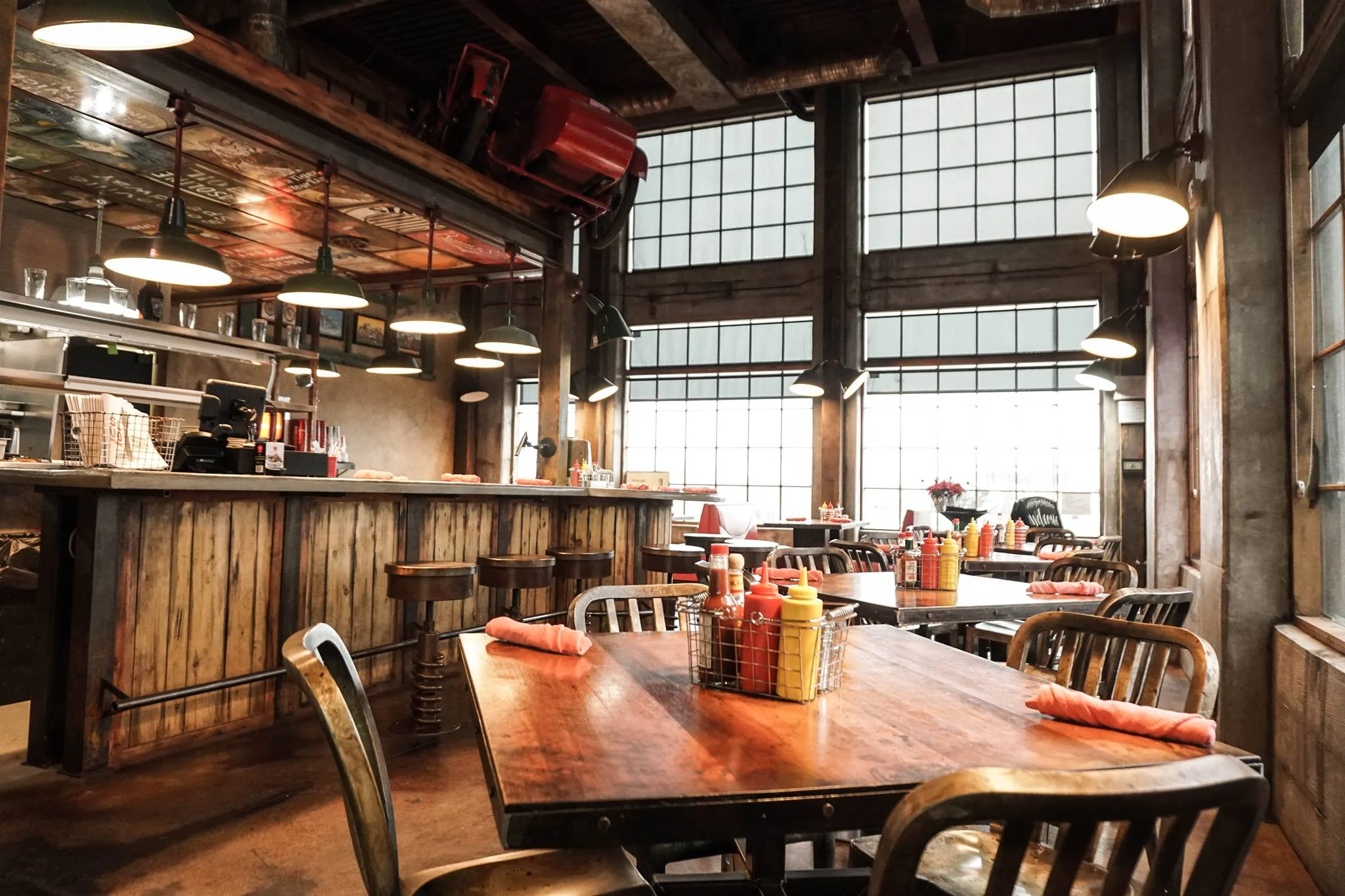 Cozy restaurant interior with rustic decor and warm lighting