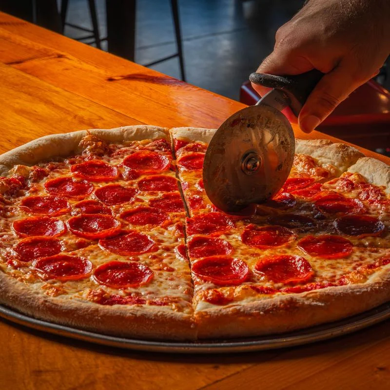 Pepperoni pizza sliced and ready to serve
