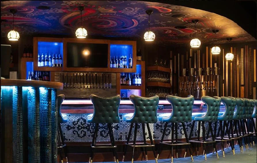 Stylish bar interior with modern seating and ambient lighting