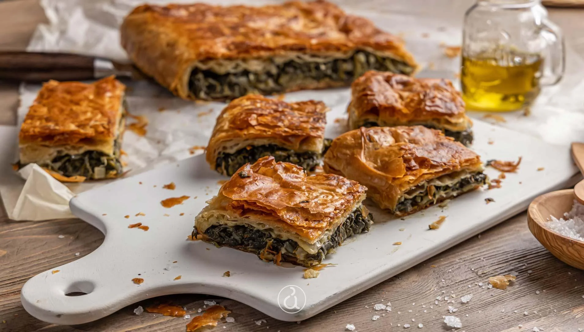 Savory Greek spanakopita with flaky pastry and spinach filling