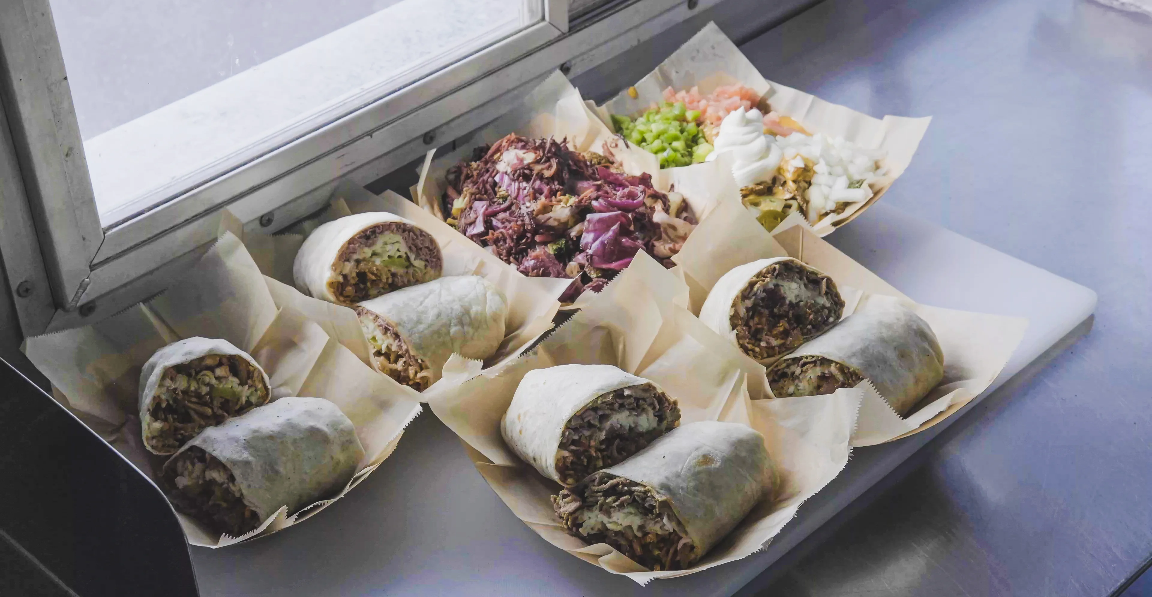 Delicious burritos served in a food truck