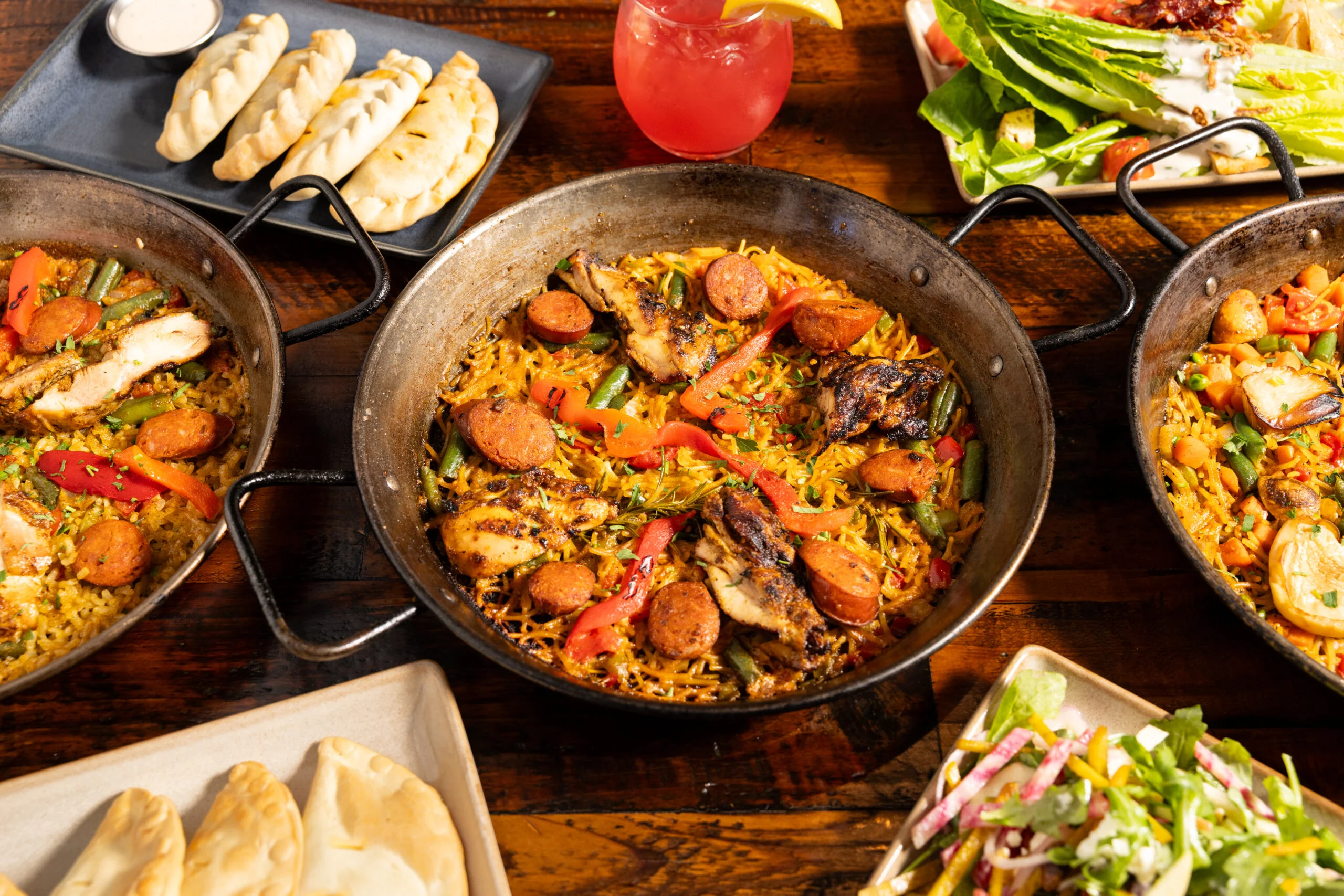 Paella, empanadas and salad
