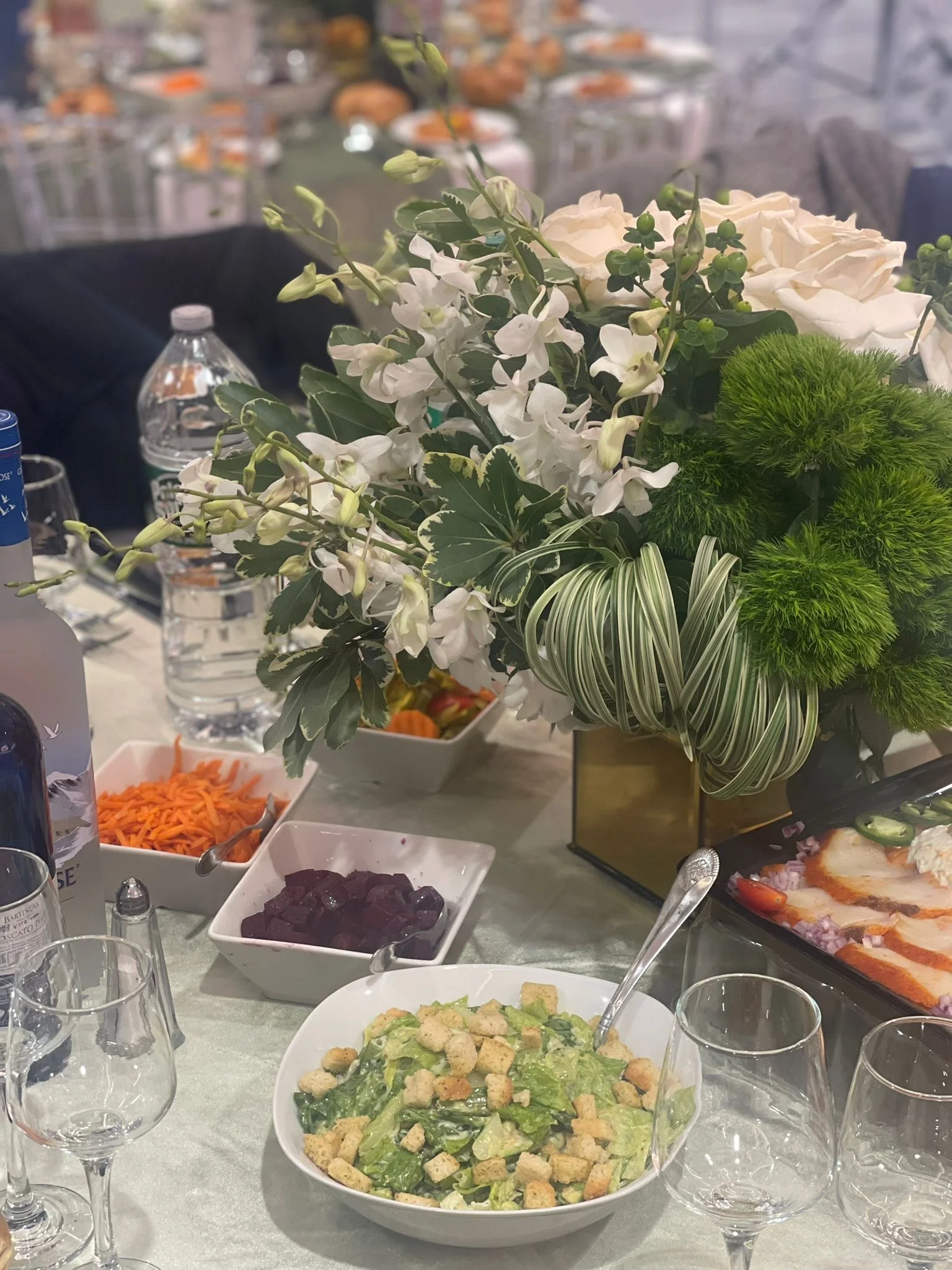 Caesar salad with croutons in a festive dining setting