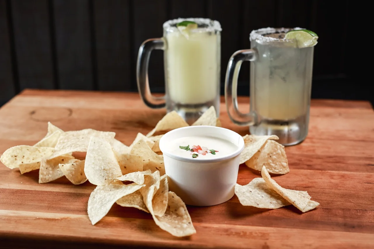 Creamy Queso and Chips and Great Margaritas, made fresh, happy hour margs.