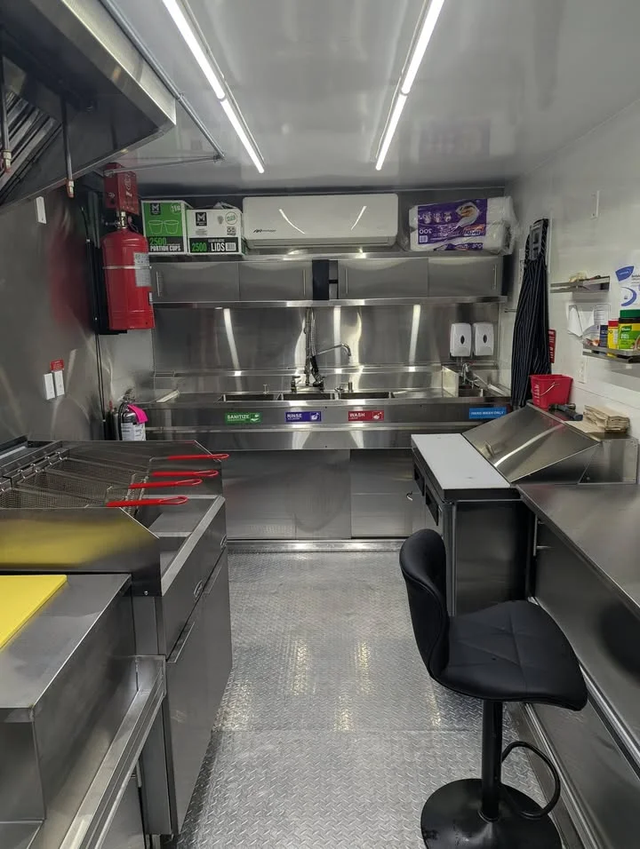 Modern food truck kitchen with stainless steel equipment