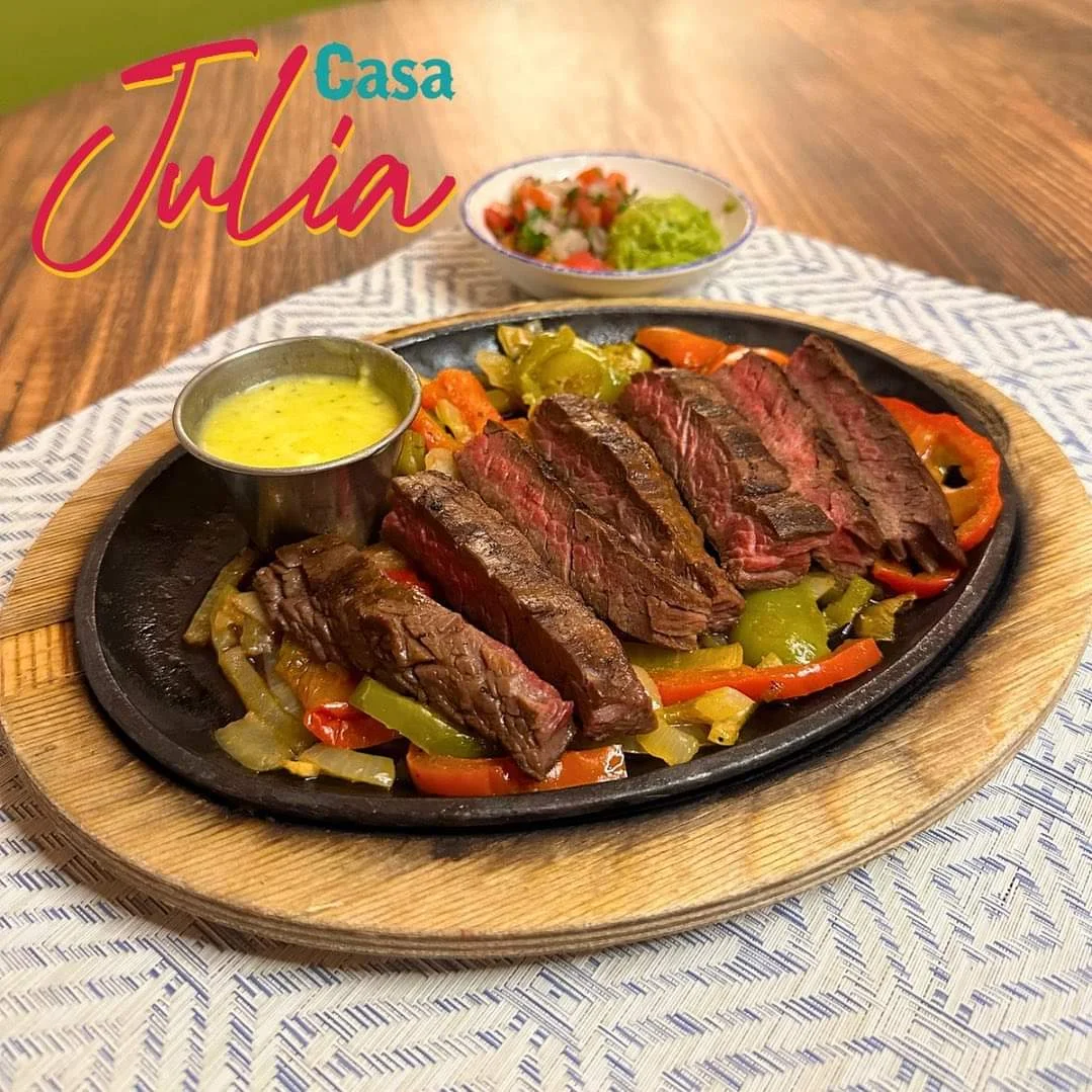 Sizzling Mexican fajitas with grilled steak and vegetables