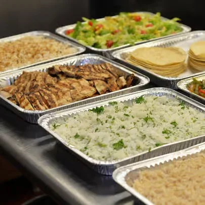 Mexican grilled chicken platter with rice and tortillas