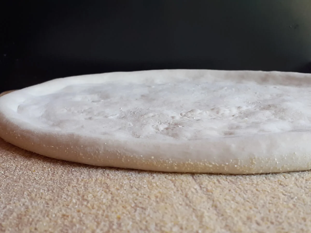 Freshly prepared pizza dough ready for toppings