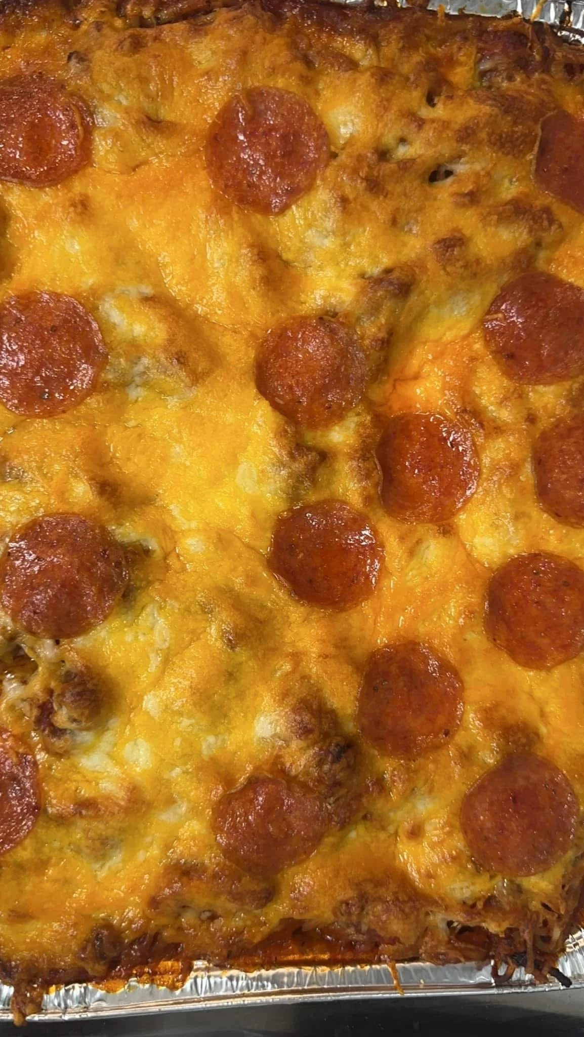 Pepperoni pizza with melted cheese and crispy crust