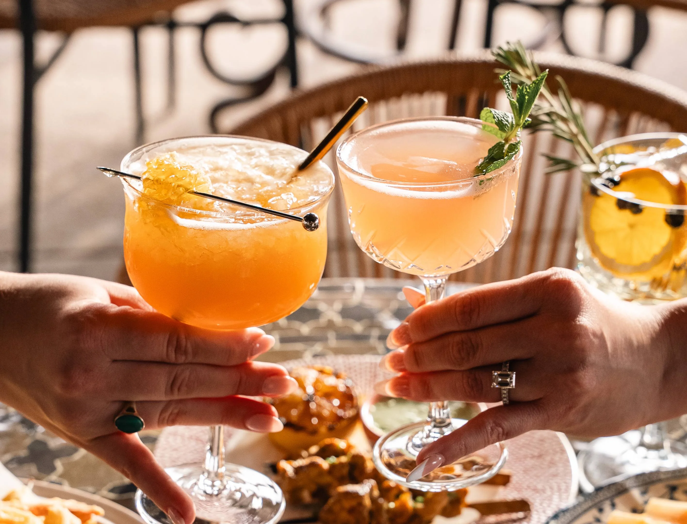 Colorful cocktails served in elegant glasses at a stylish restaurant