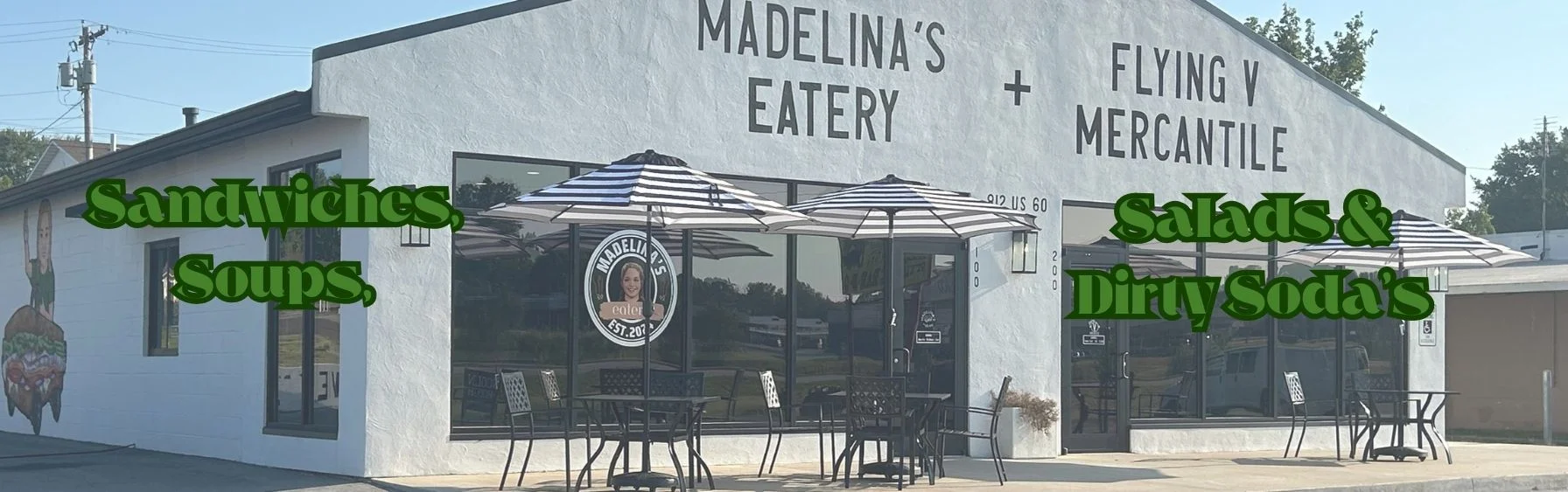 Exterior view of Madelina's Eatery with outdoor seating